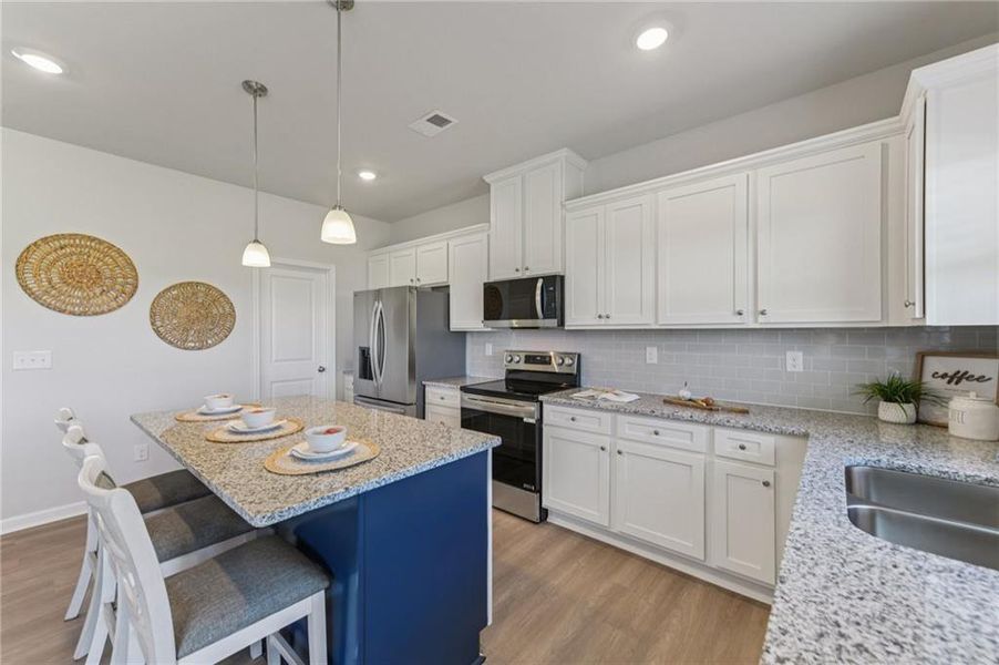 Furnished interior view inside a new home in The Hills at Cedar Creek, Winder (Image 2).