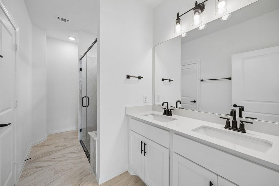 Furnished interior view inside a new home in Del Webb in Chambers Creek, Willis (Image 13).