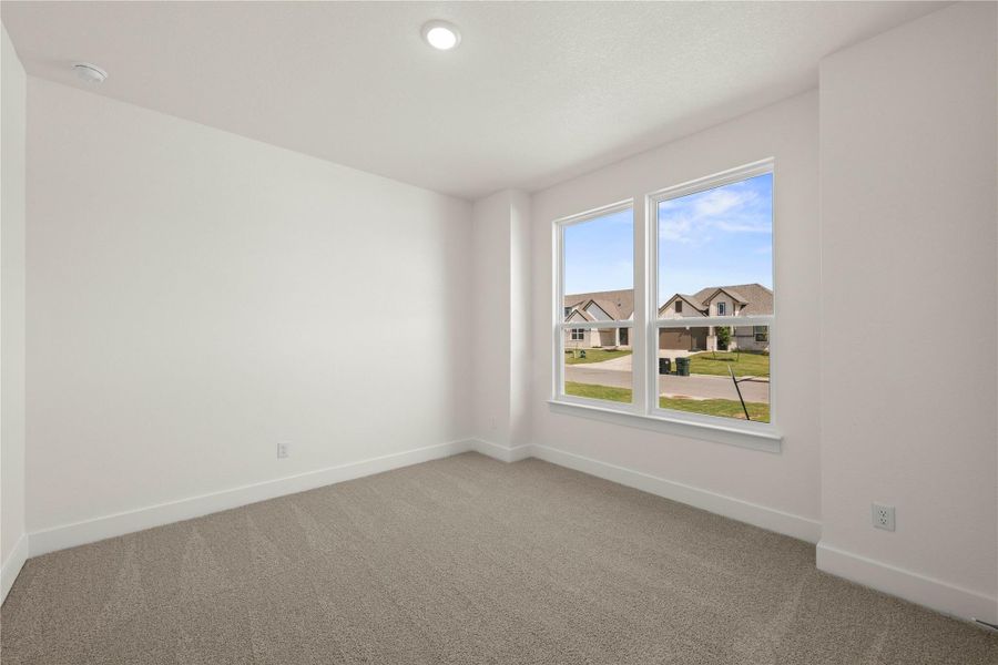 Please Note: These interior photos are not of the actual home but are of a completed one with a simialr floor plan. Finishes, features, and layouts may vary.