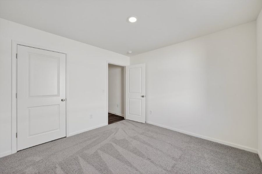 A room with white doors.