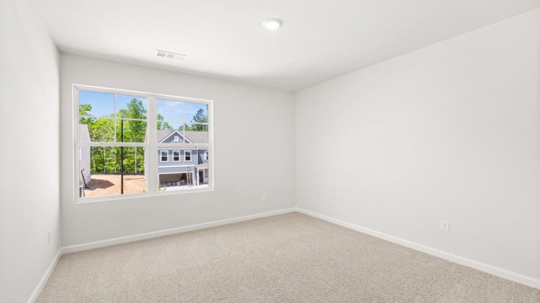 Spacious, unfurnished interior of a new home in Parkside at Carter Grove, Cartersville (Image 23).