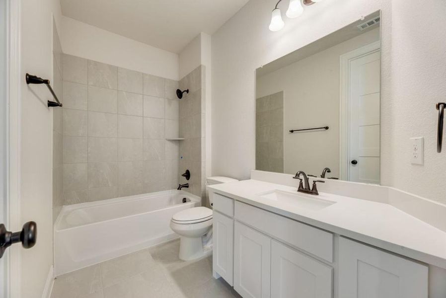 Furnished interior view inside a new home in Dominion of Pleasant Valley, Wylie (Image 12).