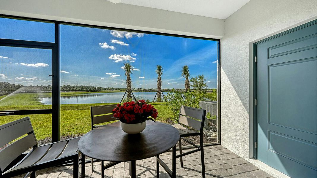 Exterior details and patio area of a home in SkySail Real Estate and Homes for Sale in Naples, FL - Neal Communities, Naples (Image 3). Exterior details and patio area of a home in SkySail Real Estate and Homes for Sale in Naples, FL - Neal Communities, Naples (Image 3).