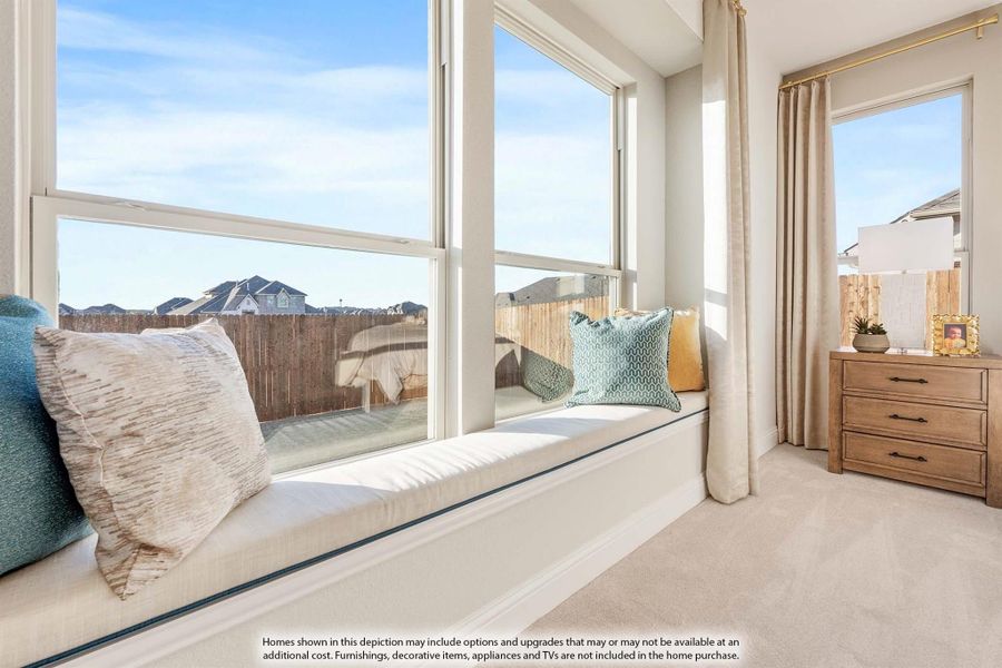 Bedroom window seat with decorative pillows, large windows, and a wooden dresser nearby Bedroom window seat with decorative pillows, large windows, and a wooden dresser nearby