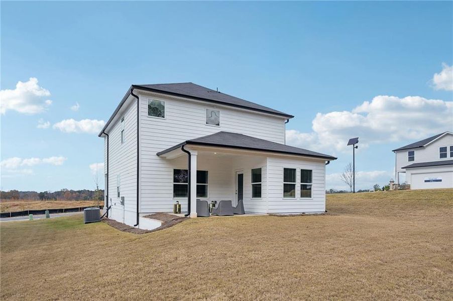Exterior details and patio area of a home in Avalon - Reserve Series, Conyers (Image 4).
