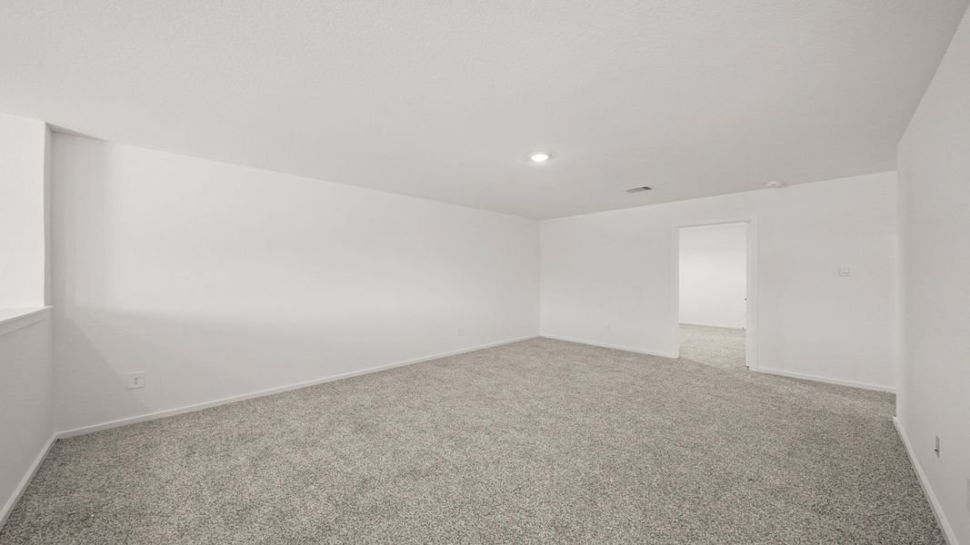Representative unfurnished interior of a home built from the Callahan by D.R. Horton in Lexington Heights, Willis (Image 22).