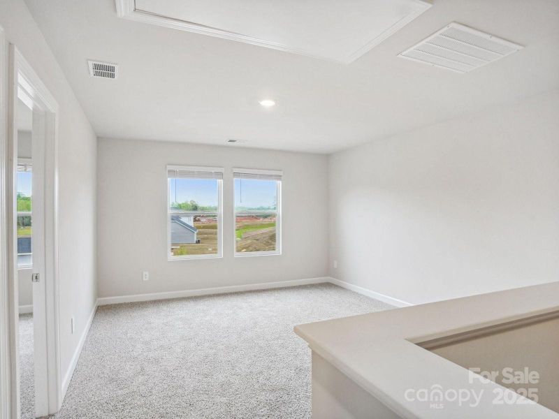 Photos are not of the actual home, but are photos of the builder home with same floorplan with similar interior finishes.