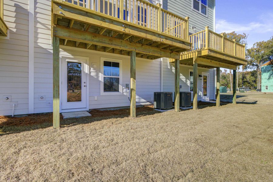 Exterior details and patio area of a home in , Johns Island (Image 24).