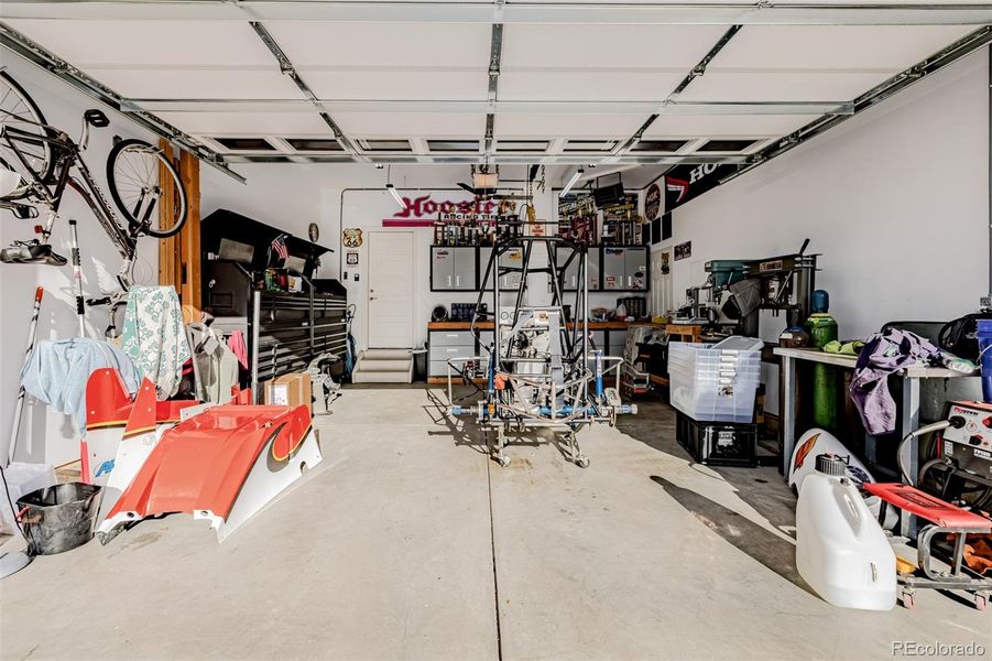 Three 115 volt AC 20'Amp plug circuits and shelves installed over garage door Three 115 volt AC 20'Amp plug circuits and shelves installed over garage door