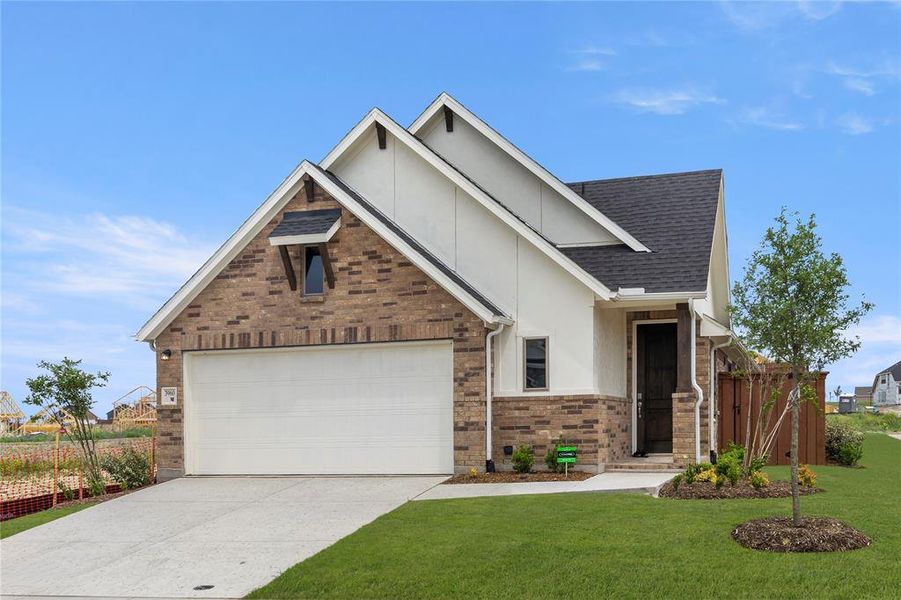 Front exterior of a new home in Heartland, Heartland, TX, highlighting curb appeal (Image 1). Front exterior of a new home in Heartland, Heartland, TX, highlighting curb appeal (Image 1).