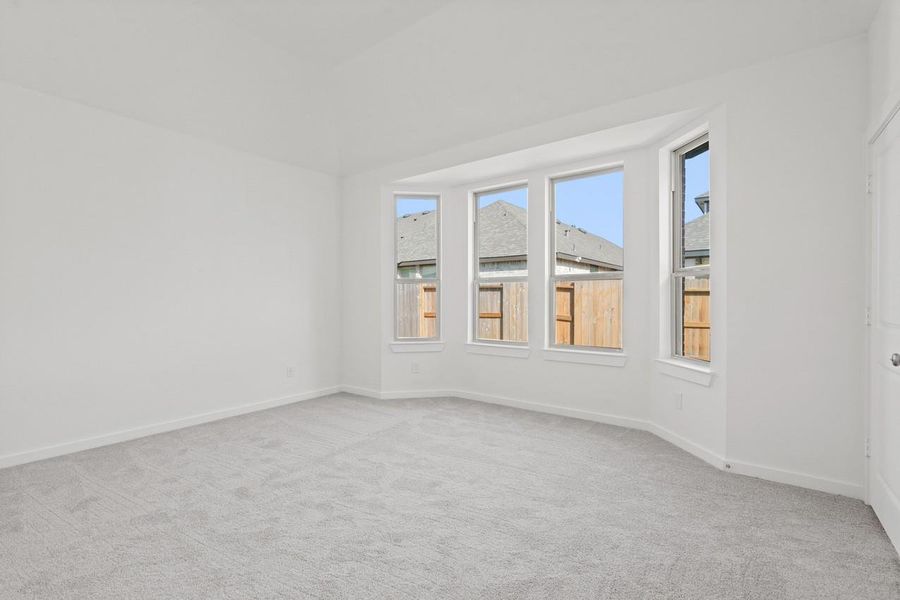 Spacious, unfurnished interior of a new home in Sunterra, Katy (Image 14).