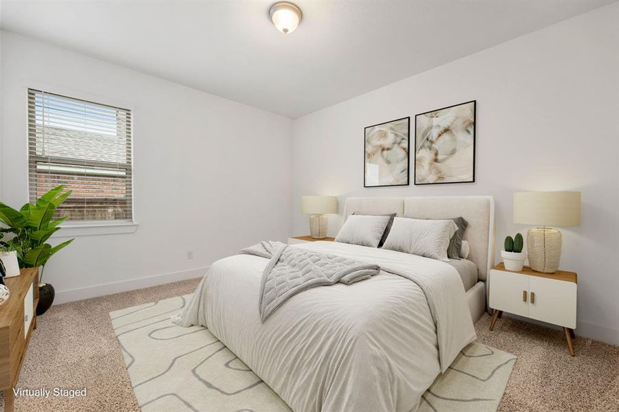 Secondary bedroom features plush carpet, neutral paint, high ceilings, ample closet, and a large window with privacy blinds.