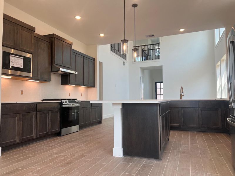 Furnished interior view inside a new home in Wood Leaf Reserve, Tomball (Image 5).