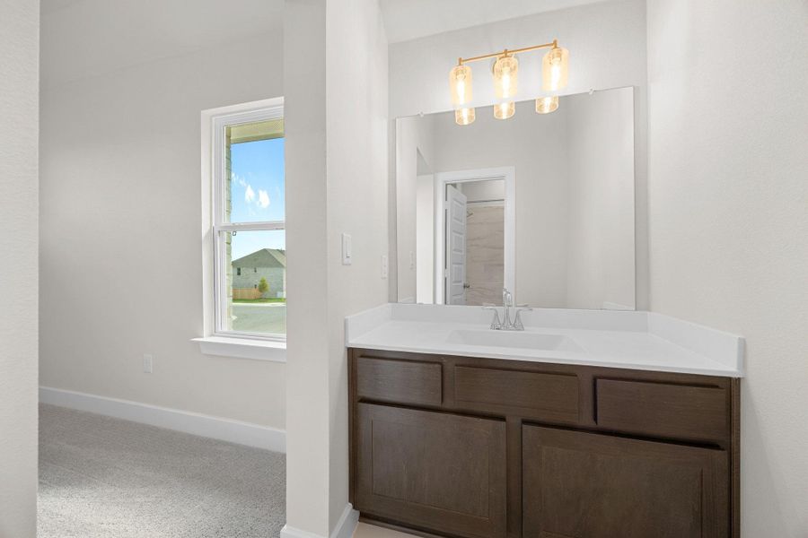 Furnished interior view inside a new home in Parmer Ranch - 60', Georgetown (Image 6).