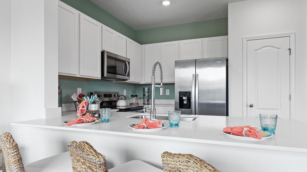 Representative furnished interior of a home built from the Pearson by D.R. Horton in The Landing, Middleburg (Image 8).