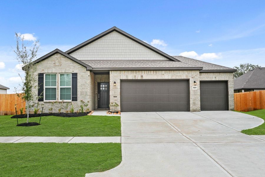 Front exterior of a new home in Valor Park, Bay City, TX, highlighting curb appeal (Image 17).