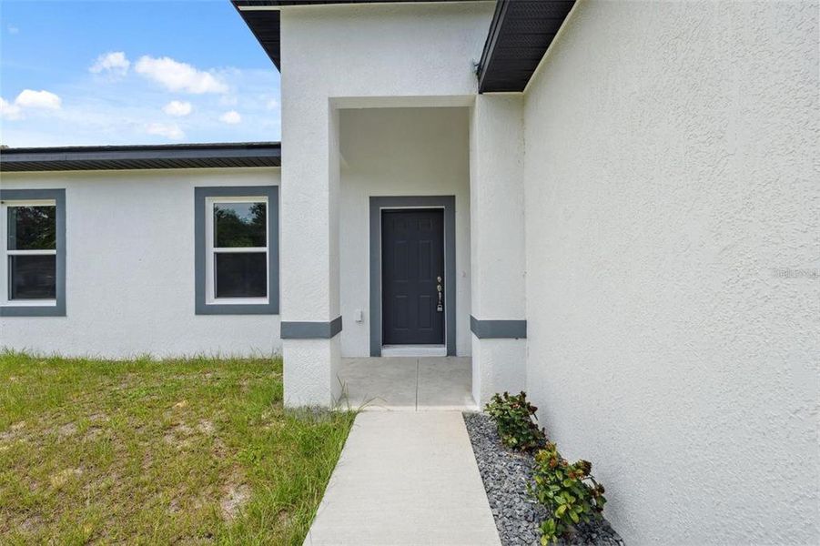 Exterior details and patio area of a home in , Ocala (Image 3).