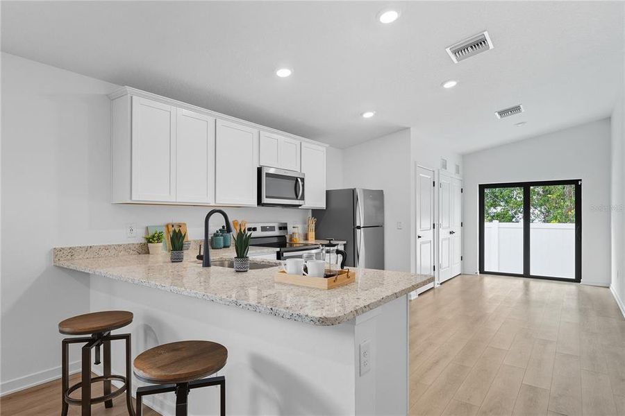 Furnished interior view inside a new home in , Tampa (Image 12). Furnished interior view inside a new home in , Tampa (Image 12).