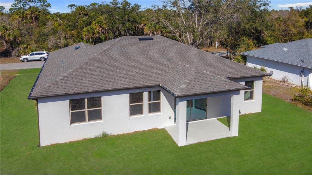 Exterior details and patio area of a home in , North Port (Image 26).