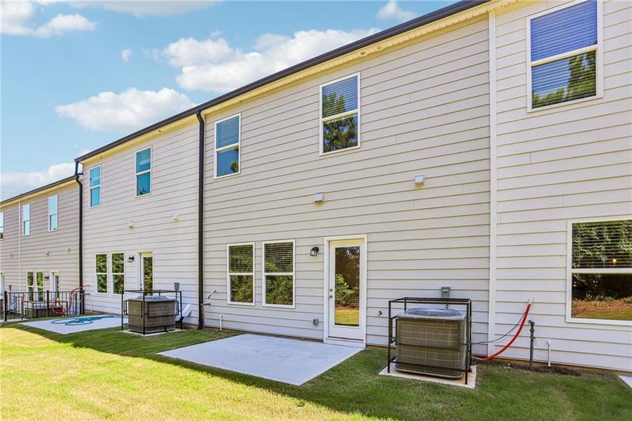Exterior details and patio area of a home in Artisan Walk, Fairburn (Image 21).