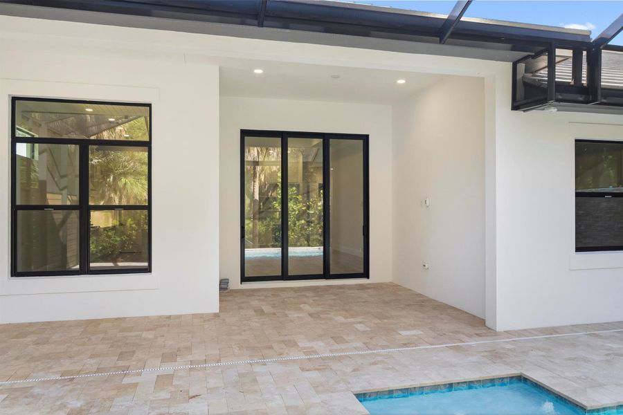 Exterior details and patio area of a home in Seaglass, Wabasso Beach (Image 32).