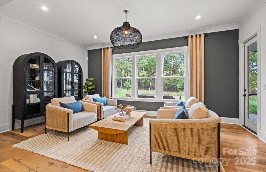 Large open light filled sunroom.  Representative photo.