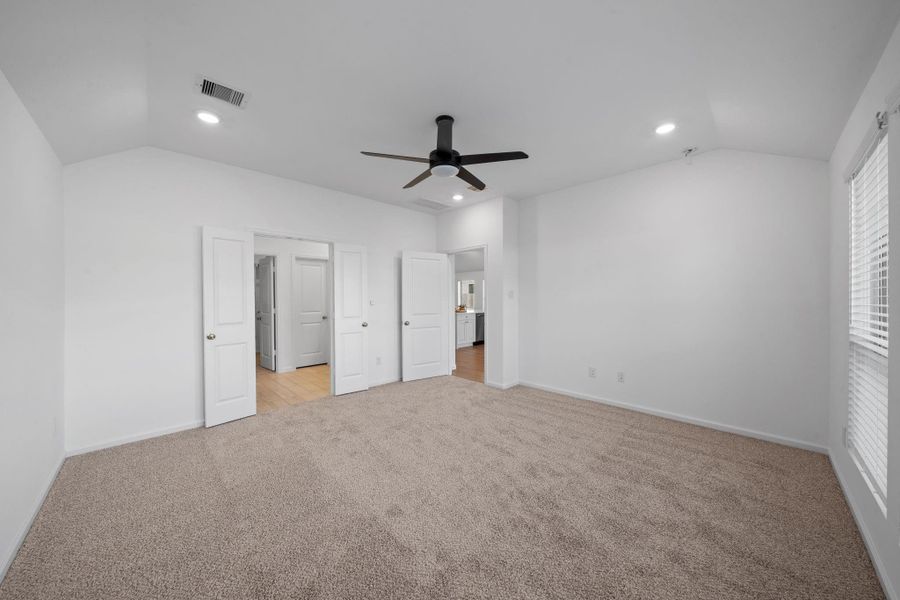 Recessed lighting creates a calm, modern ambiance in the evenings, giving the space a relaxed, elevated feel. It’s the kind of bedroom that instantly puts you at ease, roomy, bright, and ready to become your personal sanctuary.