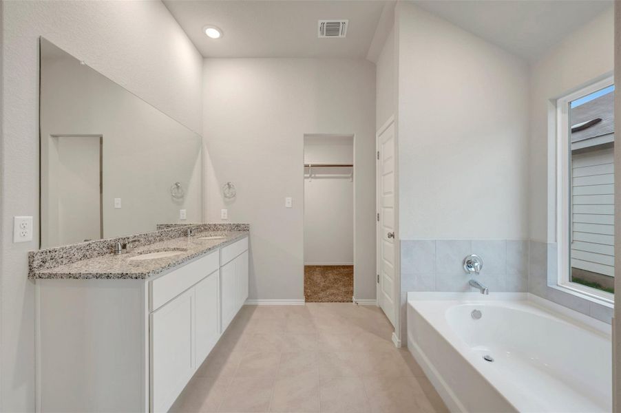 Furnished interior view inside a new home in Carillon, Manor (Image 5).