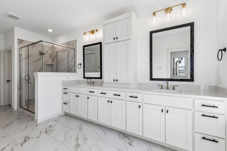 Filled with style, sophistication and space, this fantastic Owner's bath was built for two!