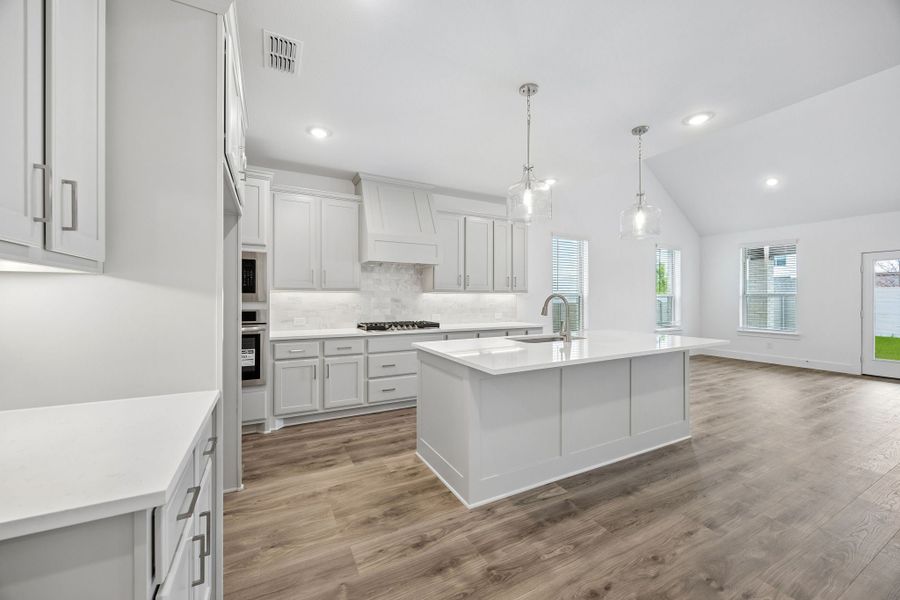Furnished interior view inside a new home in Painted Tree Woodland West, McKinney (Image 7). Furnished interior view inside a new home in Painted Tree Woodland West, McKinney (Image 7).