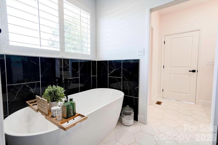 Free standing tub in primary bathroom