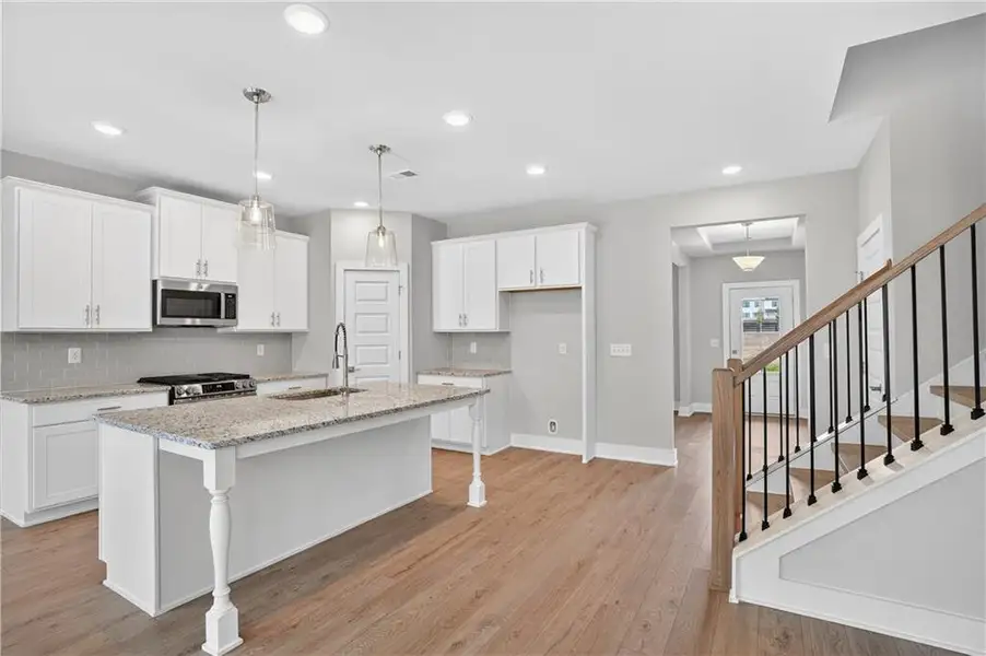 Furnished interior view inside a new home in The Fairways at Mirror Lake, Villa Rica (Image 6).