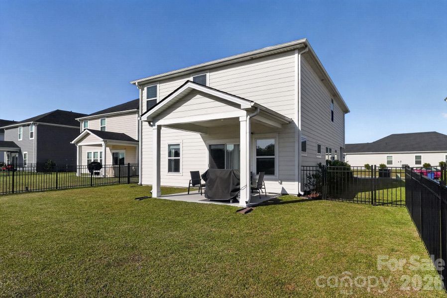 Exterior details and patio area of a home in , Longs (Image 26).