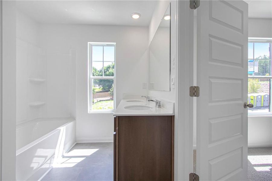 Furnished interior view inside a new home in Harvest Park, Decatur (Image 10).