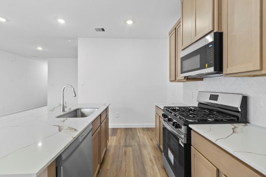 Furnished interior view inside a new home in Grand West, Houston (Image 11).