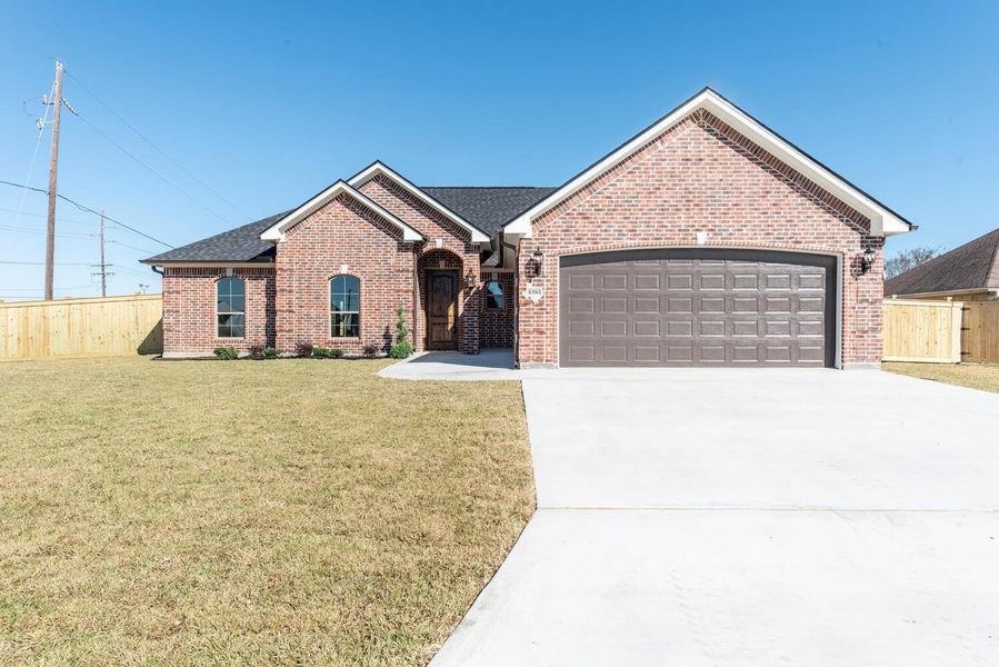 Front exterior of a new home in , Beaumont, TX, highlighting curb appeal (Image 1).