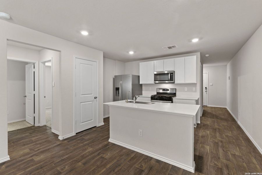 Furnished interior view inside a new home in Redbird Ranch, San Antonio (Image 12).