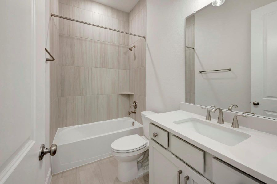 Furnished interior view inside a new home in Brookewater 55’ Homesites, Rosenberg (Image 9).