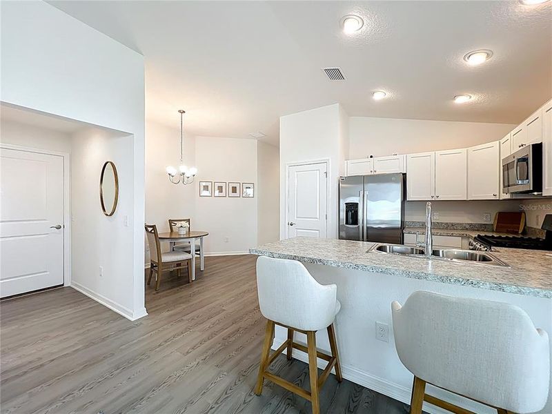 Furnished interior view inside a new home in , The Villages (Image 17).