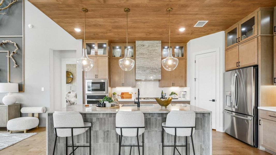 Model home photos of similar floorplans, not pictures of actual home.