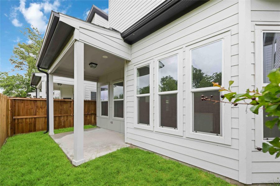 Exterior details and patio area of a home in , Houston (Image 3).