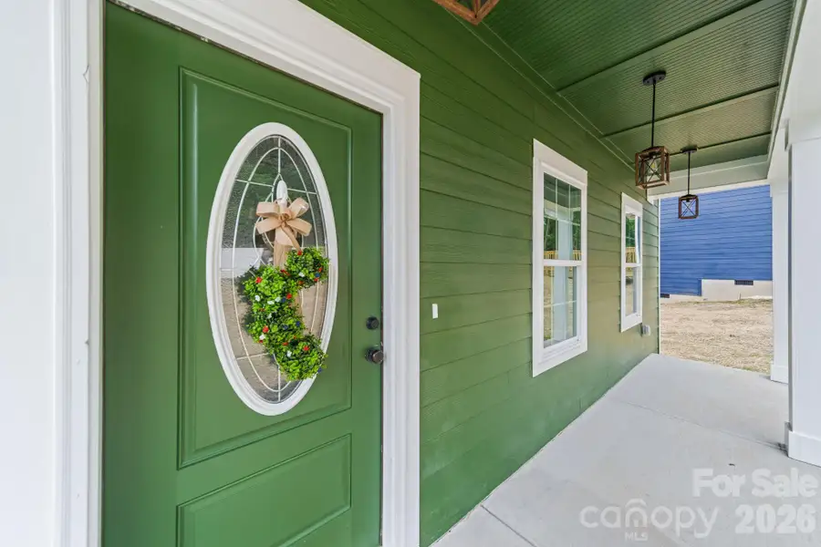 Exterior details and patio area of a home in , Badin (Image 3).