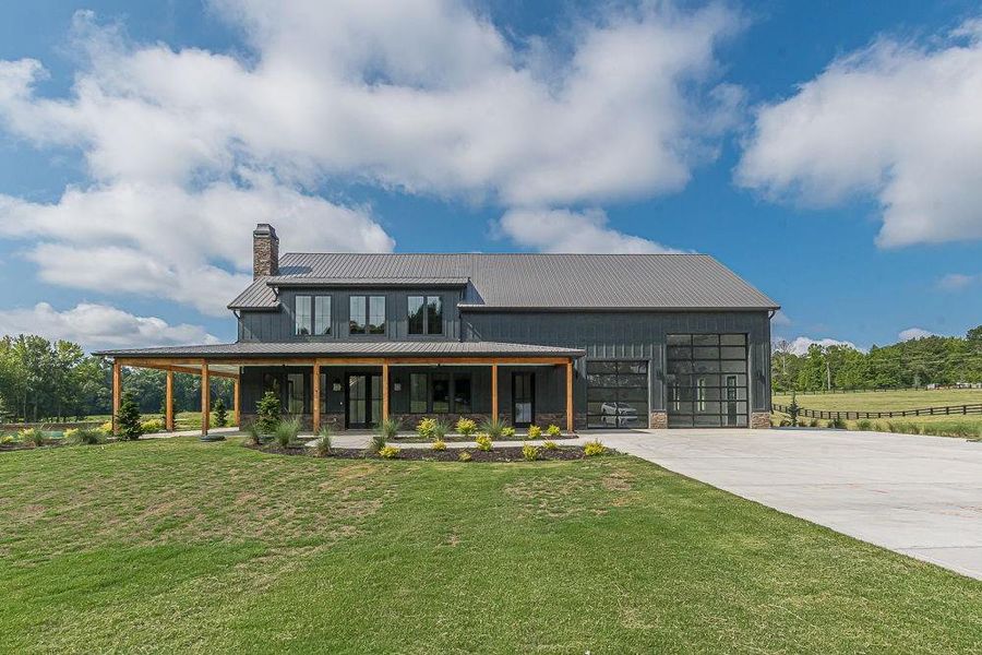 Front exterior of a new home in , Bremen, GA, highlighting curb appeal (Image 26). Front exterior of a new home in , Bremen, GA, highlighting curb appeal (Image 26).