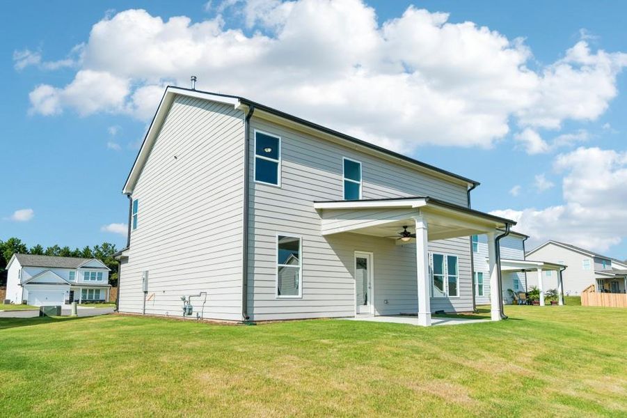 Exterior details and patio area of a home in Sutton’s Landing, Statham (Image 24).