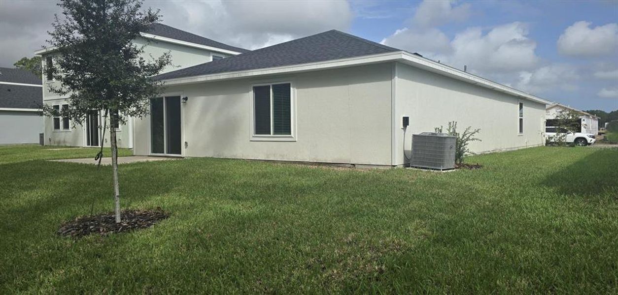 Exterior details and patio area of a home in Flagler Village - Classic Series, Palm Coast (Image 3). Exterior details and patio area of a home in Flagler Village - Classic Series, Palm Coast (Image 3).