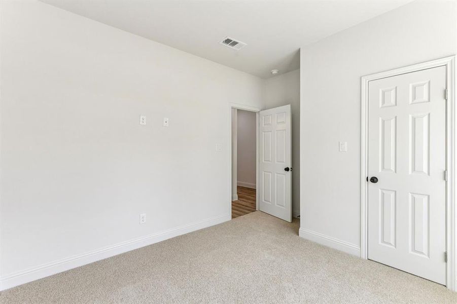 First bedroom with walk-in closet