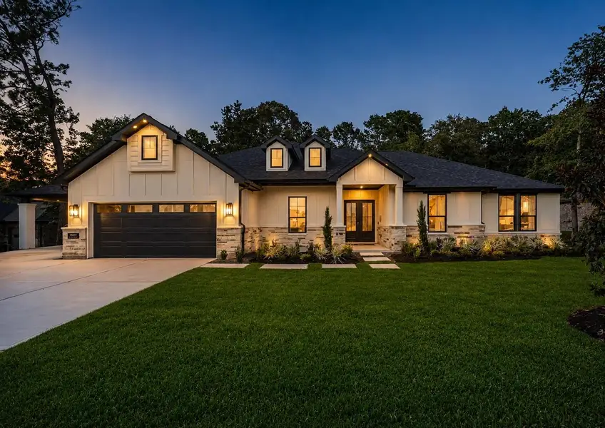 Front exterior of a home in the Deer Pines community, located in Conroe, TX (Image 2). Front exterior of a home in the Deer Pines community, located in Conroe, TX (Image 2).