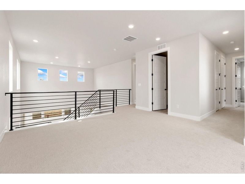 Spacious, unfurnished interior of a new home in RainDance, Windsor (Image 11).