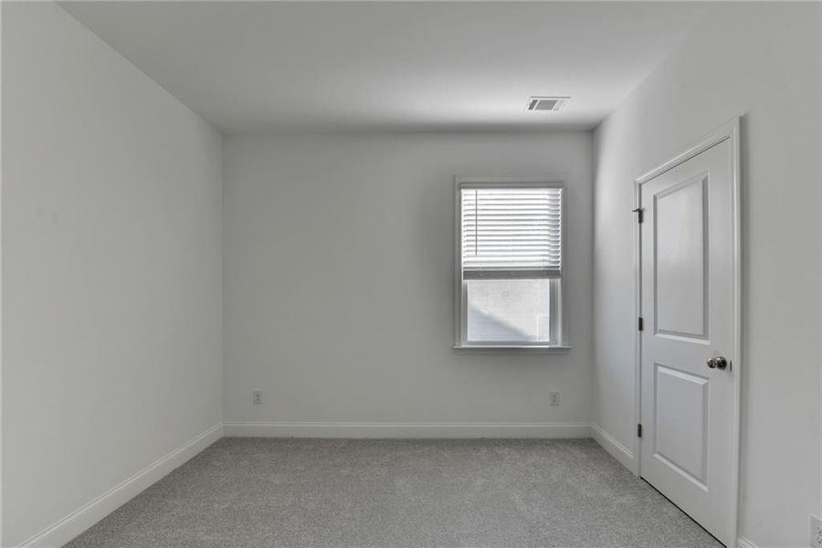 Spacious, unfurnished interior of a new home in Bailey Fence, Dacula (Image 67).
