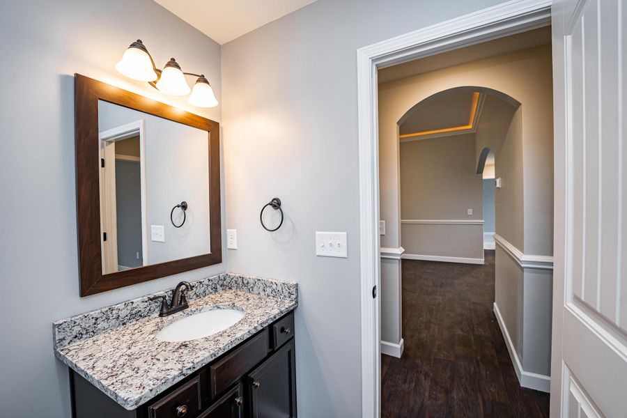 Representative furnished interior of a home built from the Saxon by Enchanted Homes in Guadalupe Heights, Seguin (Image 8).